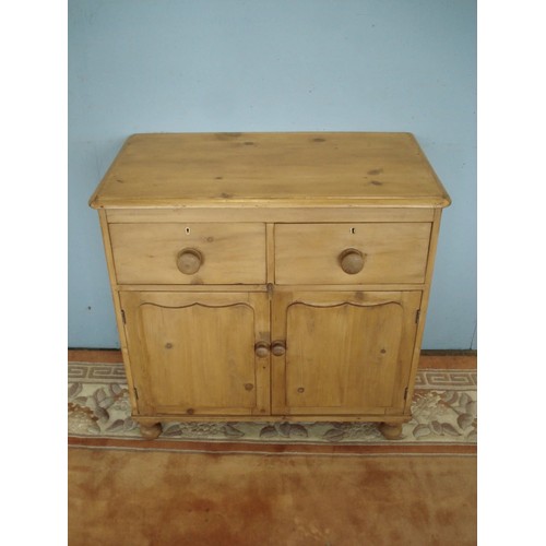 4 - A Victorian pine small Dresser Base fitted pair of drawers above pair of Cupid's Bow panelled doors ... 