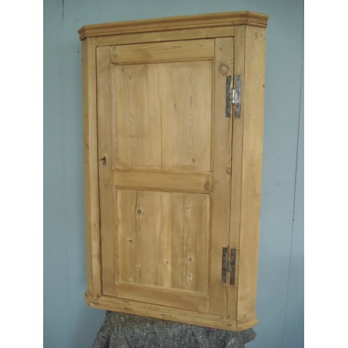 47 - An antique pine hanging Corner Cupboard fitted single panelled door 4ft H x 2ft 8in W x 1ft 7in D