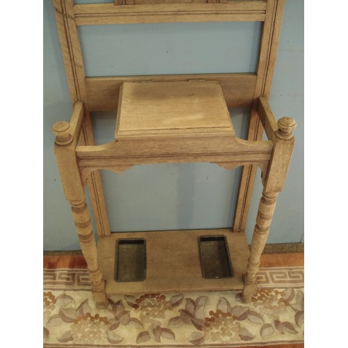 100 - An Edwardian oak Hall Stand with bevelled mirror plate 6ft 6in H x 2ft W