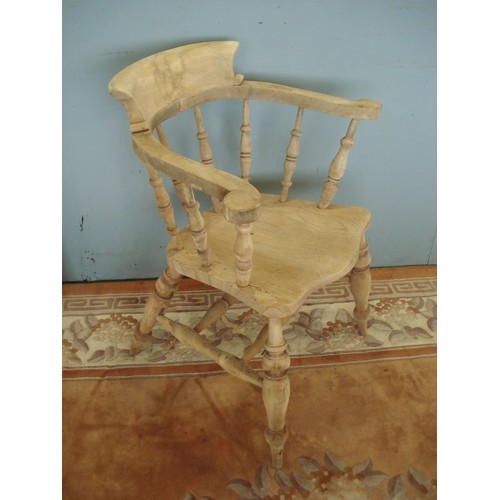 120 - An antique beech and elm Smoker's Bow Chair with turned spindle back 2ft 9in H x 2ft 2in W