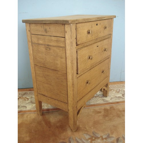 122 - An antique blonde oak small Chest of three long drawers 2ft 6in H x 2ft 2in W x 1ft 3in D