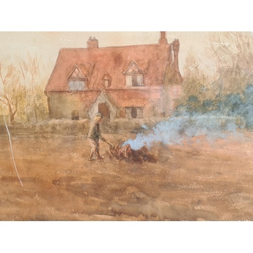 185 - A framed Watercolour of a bonfire in front of a cottage 1ft 10in x 1ft 7in and another of a bridge o... 