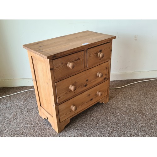 23 - A modern pine small Chest of two short over two long drawers on bracket feet 2ft W x 2ft H