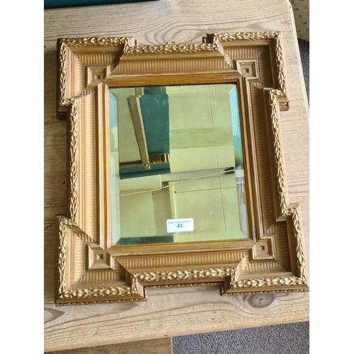 43 - A gilt framed Wall Mirror with bevelled glass 1ft 7in H x 1ft 5in W