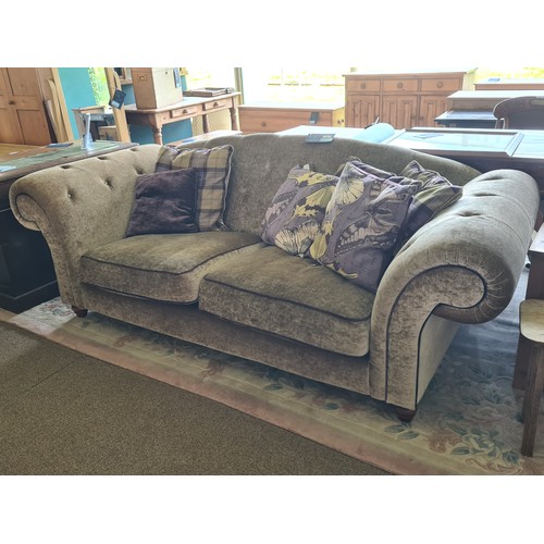 53 - A good quality button upholstered Humpback three seater Sofa 8ft W x 2ft 10in H x 3ft 4in D
