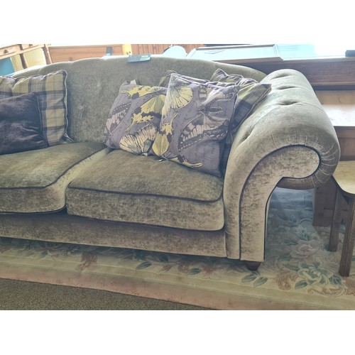 53 - A good quality button upholstered Humpback three seater Sofa 8ft W x 2ft 10in H x 3ft 4in D