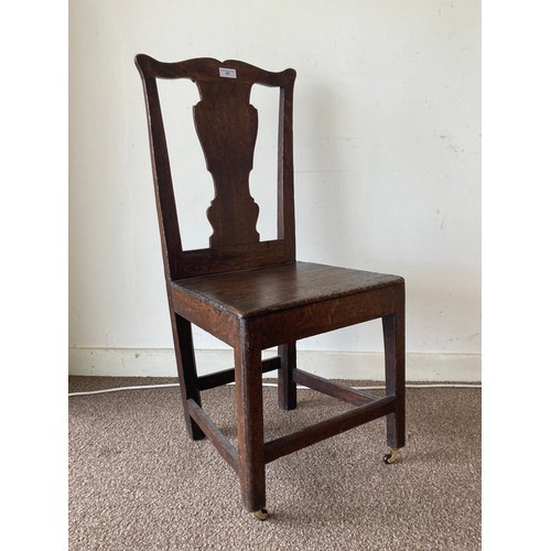 67 - An antique oak Single Chair with vase splat back