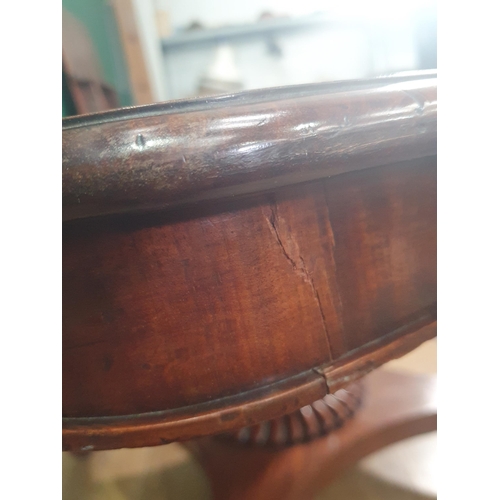 486 - A Victorian mahogany Breakfast Table with moulded rectangular top on turned column and platform base... 