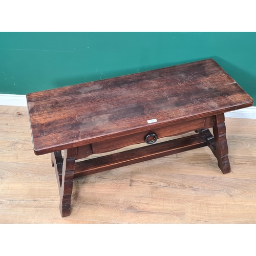 496 - An oak Coffee Table fitted single drawer on shaped supports 3ft 8in W x 1ft 10in H. (R2).