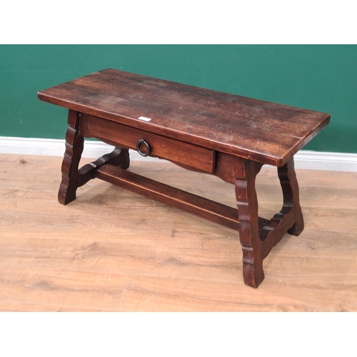 496 - An oak Coffee Table fitted single drawer on shaped supports 3ft 8in W x 1ft 10in H. (R2).