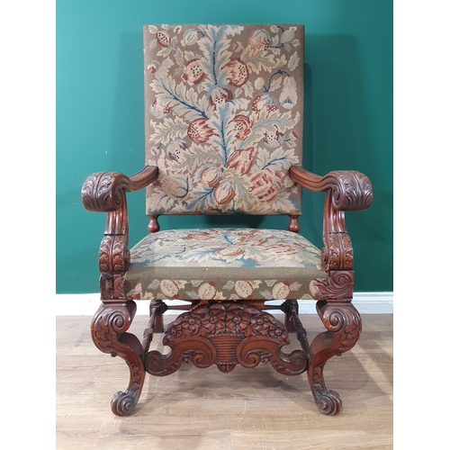 533 - A carved walnut Carolean style Throne Elbow Chair with floral upholstered back and seats, acanthus c... 