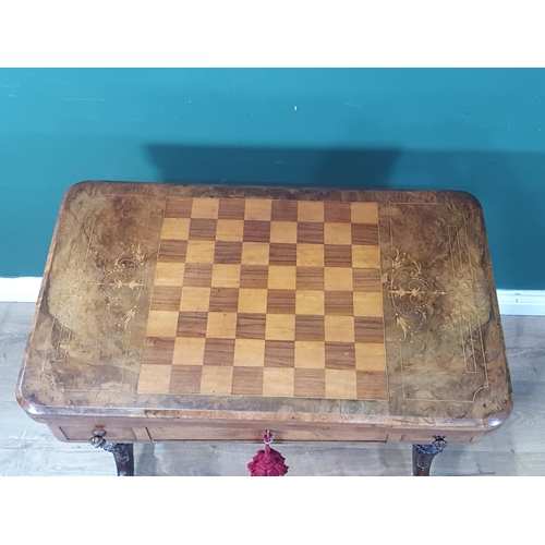 543 - A Victorian walnut Games/Card/Work Table with chessboard fold-over top, satinwood inlay, baize lined... 