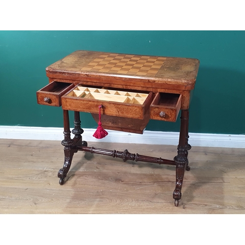 543 - A Victorian walnut Games/Card/Work Table with chessboard fold-over top, satinwood inlay, baize lined... 