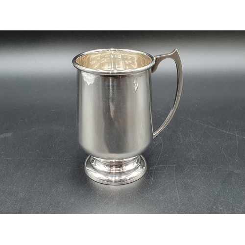 12 - A George VI silver Christening Mug on pedestal bases, Birmingham 1938