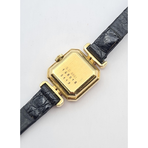 121 - A gem-set Chopard Cocktail Watch the square  gold dial with gold hands, bezel and lugs pavé-set bril... 