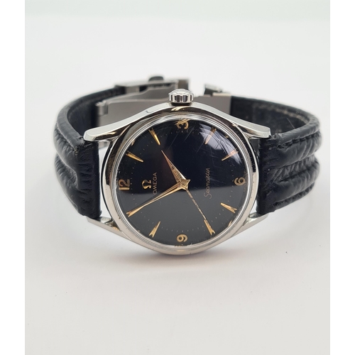 127 - A gentleman's Omega Seamaster Automatic Wristwatch the black dial with arabic numerals at quarters t... 