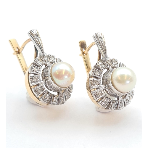 141 - A pair of Cultured Pearl and Diamond Earrings each set single central pearl within halo frame of ill... 