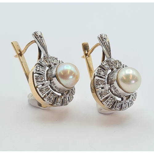 141 - A pair of Cultured Pearl and Diamond Earrings each set single central pearl within halo frame of ill... 