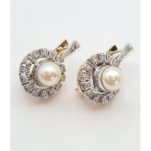 141 - A pair of Cultured Pearl and Diamond Earrings each set single central pearl within halo frame of ill... 