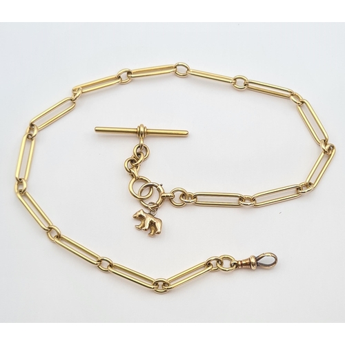 148 - A gold long link Watch Albert, approx 46cms long, suspending small bear charm, approx 61gms