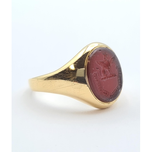 150 - An 18ct gold Intaglio Seal Ring set carnelian carved family crest, ring size Q, approx 8.10gms