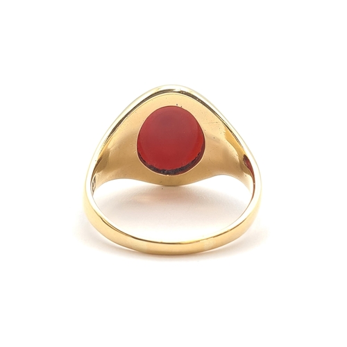 150 - An 18ct gold Intaglio Seal Ring set carnelian carved family crest, ring size Q, approx 8.10gms