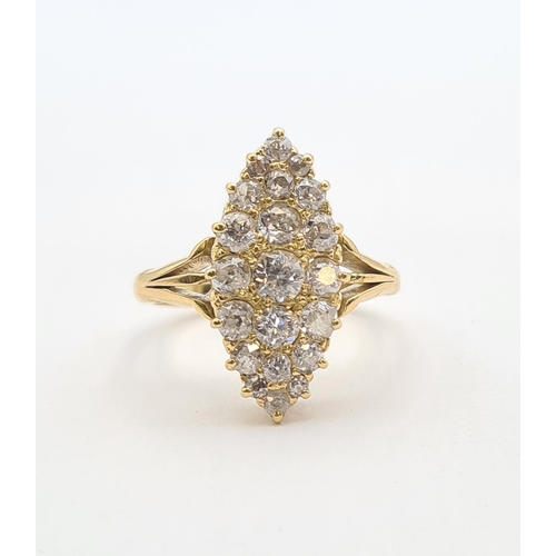 151 - A Diamond Ring pavé-set numerous old-cut diamonds to the marquise shaped plaque, stamped 18ct, ring ... 