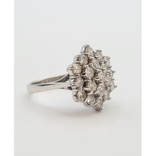 155 - A hexagonal Diamond Cluster Ring claw-set nineteen brilliant-cut stones in white gold stamped 18ct, ... 