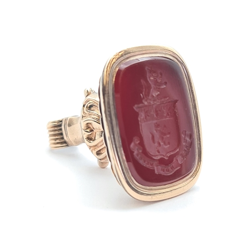 156 - A gold Intaglio Seal Fob set carnelian carved crest, unmarked, untested, approx 18.60gms