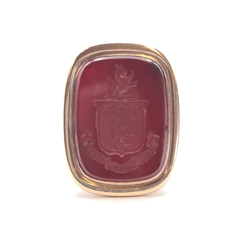 156 - A gold Intaglio Seal Fob set carnelian carved crest, unmarked, untested, approx 18.60gms