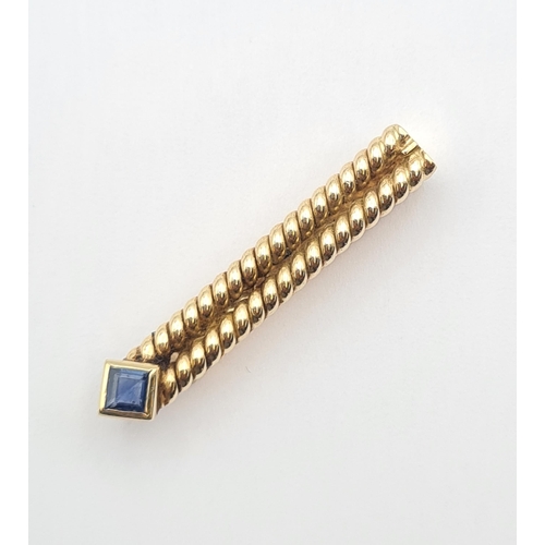 157 - A Sapphire Tie Clip set square step-cut stone, stamped 14K, approx 39mm long, approx 7.60gms