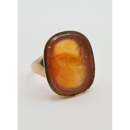 160 - An Intaglio Seal Ring the carnelian carved classical bust in profile, stamped 9ct, ring size O, appr... 