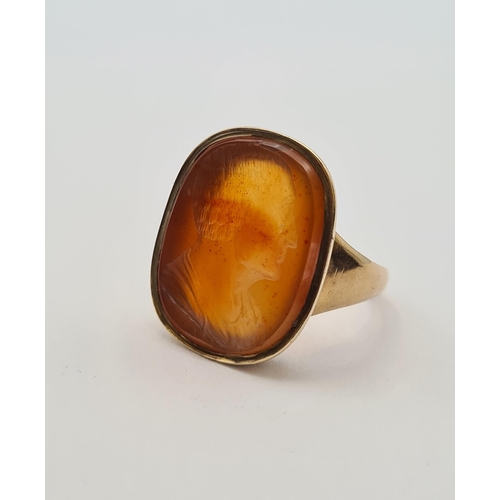 160 - An Intaglio Seal Ring the carnelian carved classical bust in profile, stamped 9ct, ring size O, appr... 