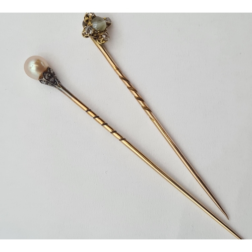 163 - A Stick Pin with pearl and rose-cut diamond finial and a Stick Pin set chatoyant stone within four o... 