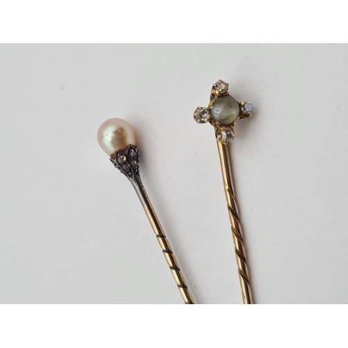 163 - A Stick Pin with pearl and rose-cut diamond finial and a Stick Pin set chatoyant stone within four o... 