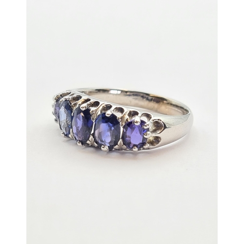 165 - A Sapphire five stone Ring claw-set graduated oval-cut stones, one stone replaced, in white gold, ri... 