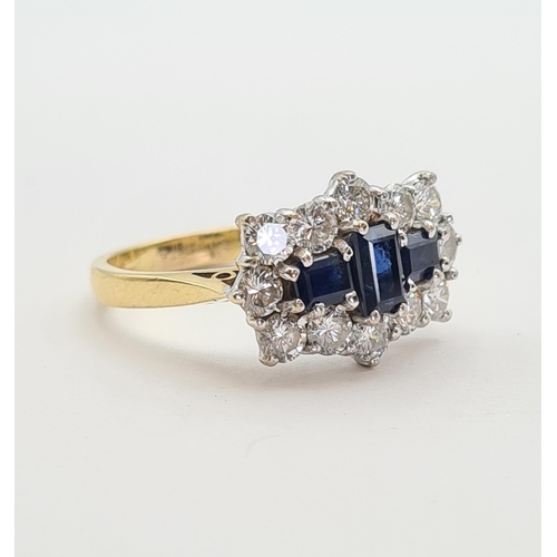 175 - A Sapphire and Diamond Cluster Ring claw-set three step-cut sapphires within a frame of twelve brill... 