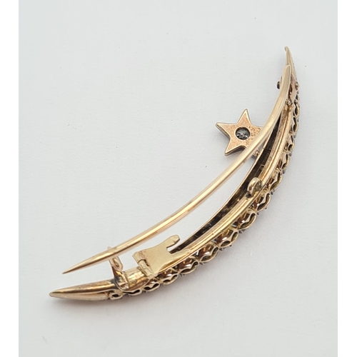 186 - A Diamond Star and Crescent Brooch set graduated old and rose-cut stones in silver backed with gold,... 