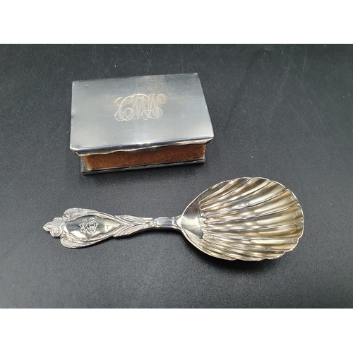 19 - A Victorian silver Caddy Spoon with shell bowl and ornate stem engraved initials, London 1868, and a... 