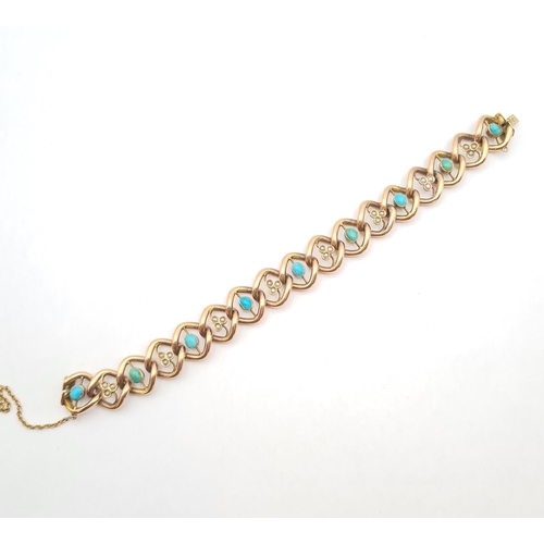 200 - A Turquoise and Seed Pearl Bracelet the openwork links set alternating oval turquoise cabochons and ... 