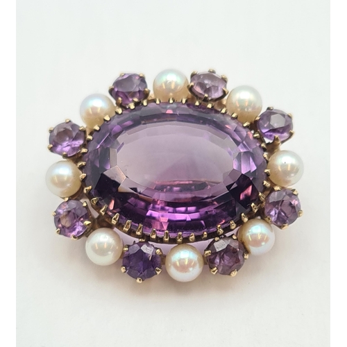 203 - An Amethyst and Cultured Pearl Brooch claw-set oval-cut amethyst within frame of alternating culture... 