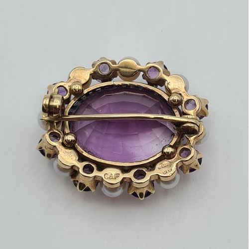 203 - An Amethyst and Cultured Pearl Brooch claw-set oval-cut amethyst within frame of alternating culture... 