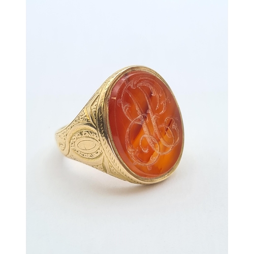 210 - A gentleman's gold Signet Ring set carnelian engraved monogram, unmarked, ring size O, approx 11.10g... 