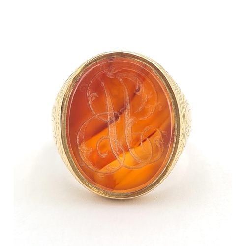 210 - A gentleman's gold Signet Ring set carnelian engraved monogram, unmarked, ring size O, approx 11.10g... 