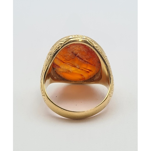 210 - A gentleman's gold Signet Ring set carnelian engraved monogram, unmarked, ring size O, approx 11.10g... 