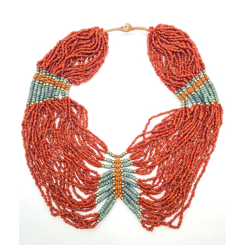 215 - An Indian multi-strand Coral Bead Necklace