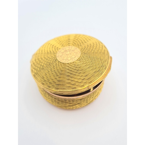 225 - A circular gold plated Trinket Box with basket weave effect and hinged lid, approx 7cms diameter