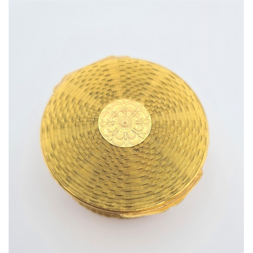 225 - A circular gold plated Trinket Box with basket weave effect and hinged lid, approx 7cms diameter