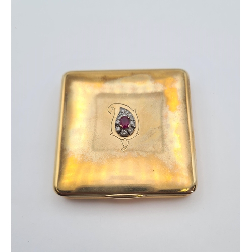 230 - A 1940's CARTIER 9ct gold square Powder Compact the lid applied claw-set oval-cut ruby within teardr... 