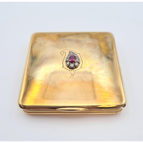 230 - A 1940's CARTIER 9ct gold square Powder Compact the lid applied claw-set oval-cut ruby within teardr... 